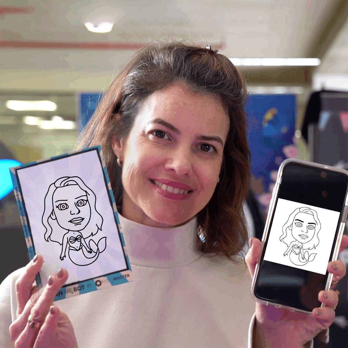 A group poses for a photo at a BAFTA-themed event, with one person holding a trophy near a large gold mask statue.