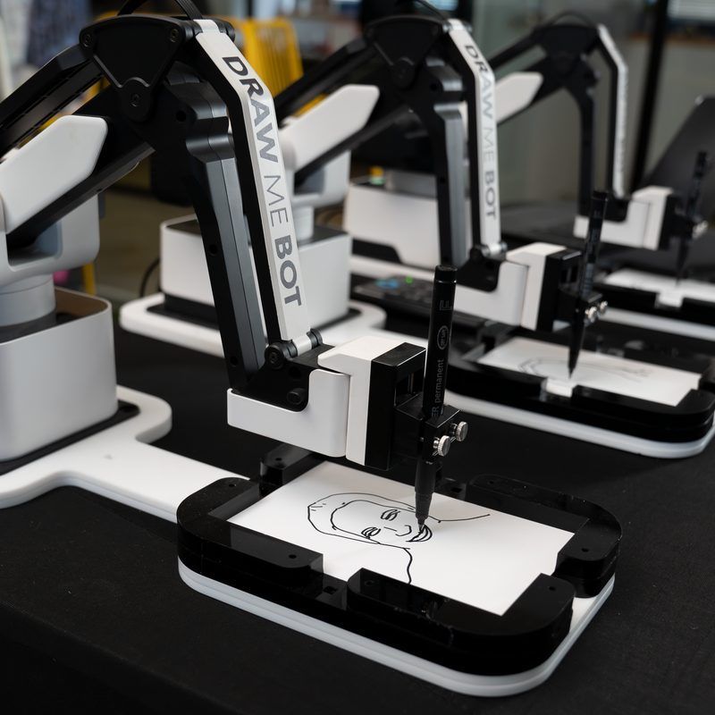Several robotic arms labeled
