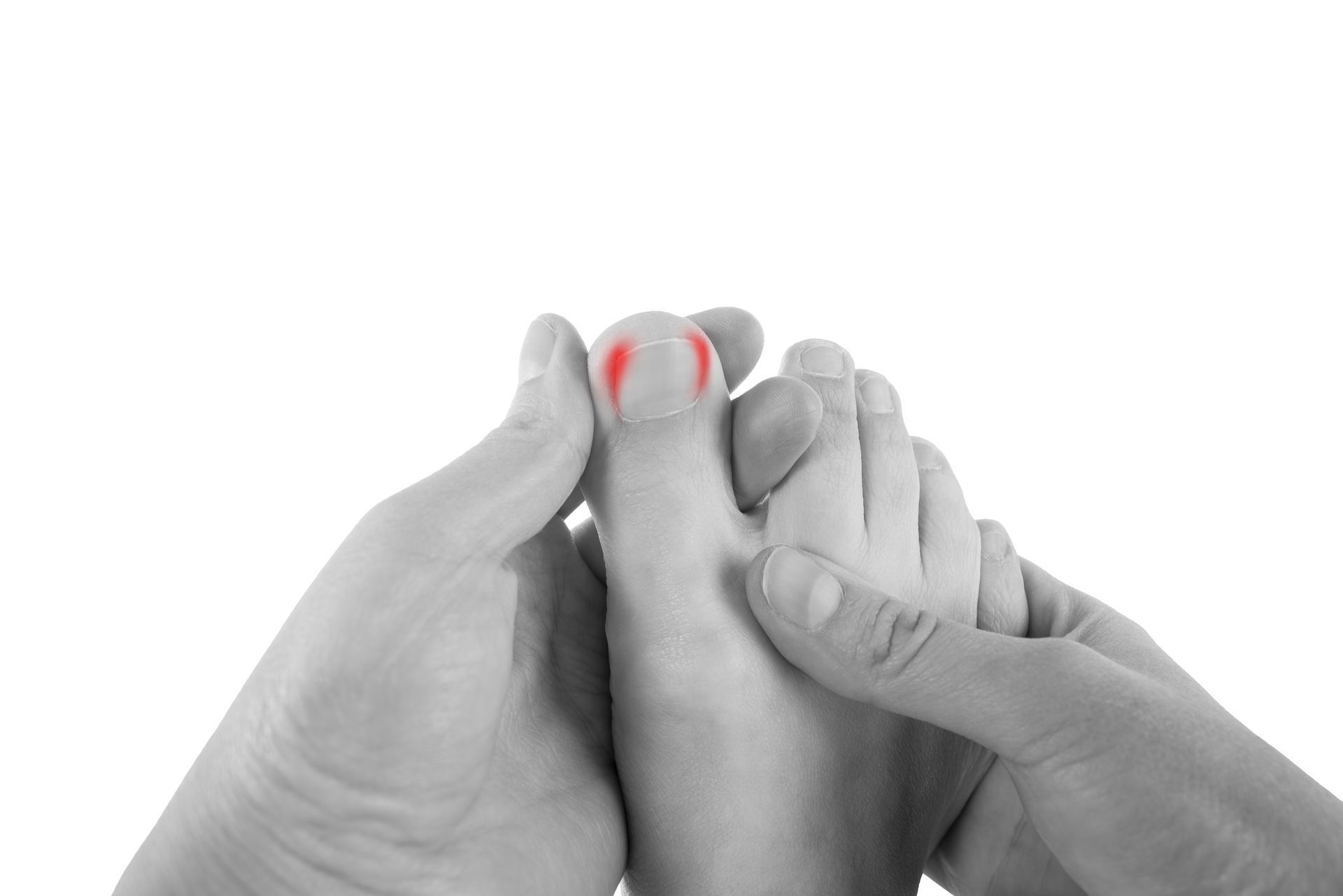 a person holding their toe with red marks around it