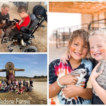 A boy in a wheelchair is holding a dog and two girls are holding rabbits.