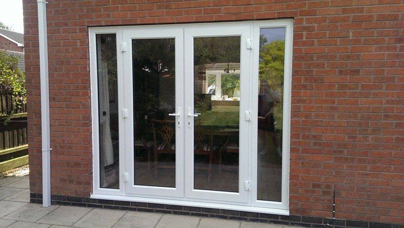 French Door-New UPVC in white and side panels