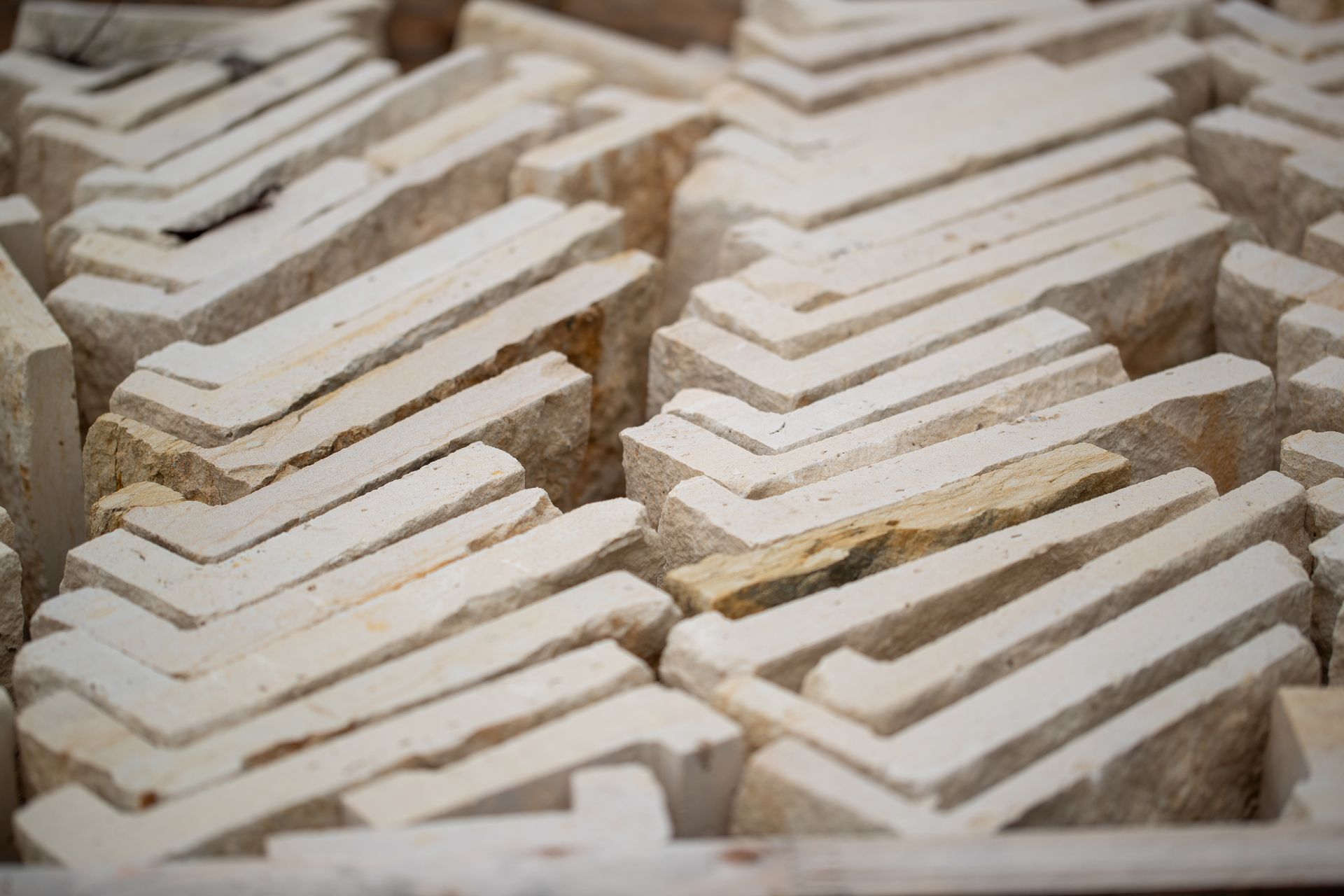 a bunch of white bricks are stacked on top of each other