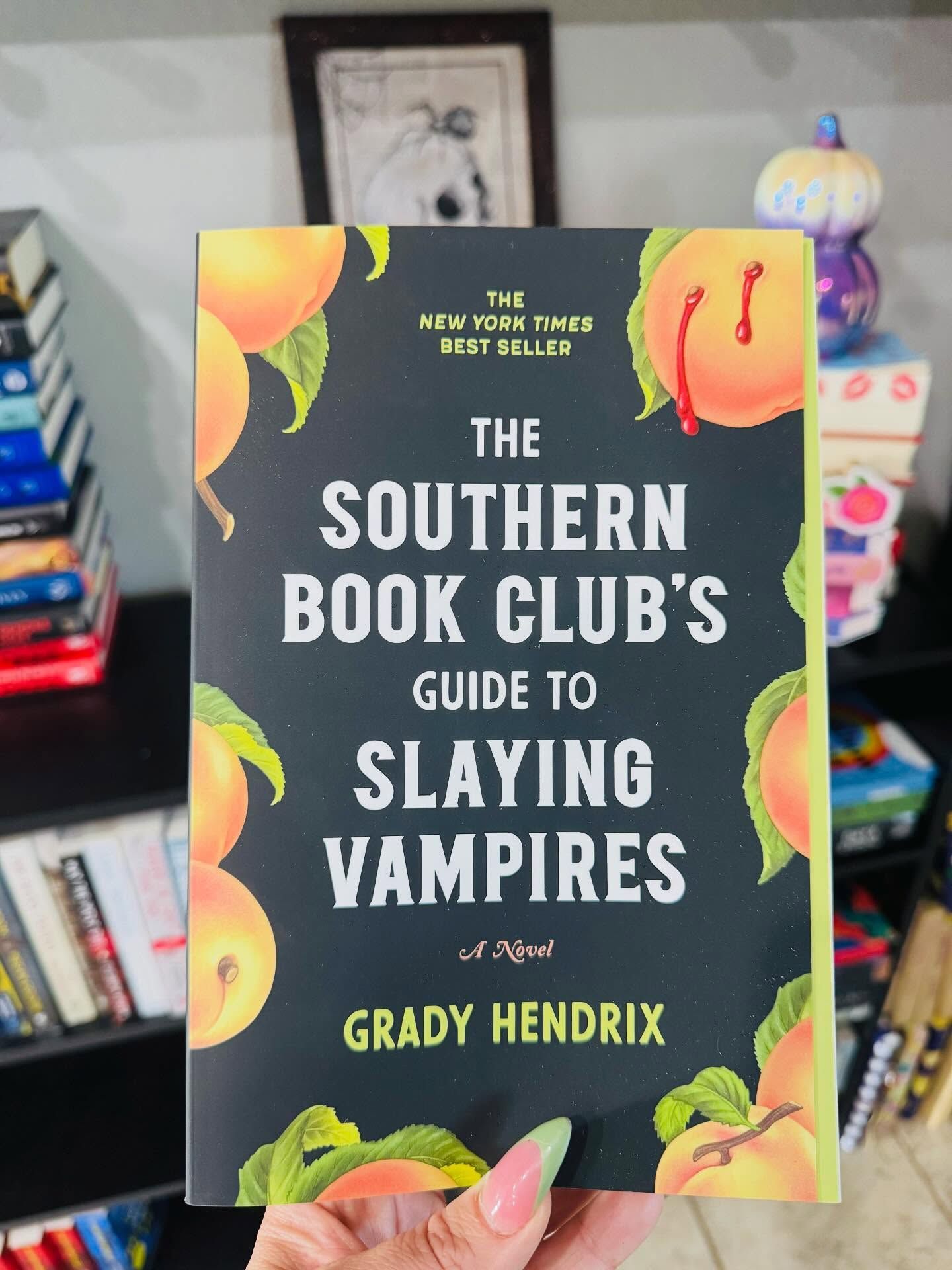 Book cover: "The Southern Book Club's Guide to Slaying Vampires" by Grady Hendrix. Peaches surround title on black.