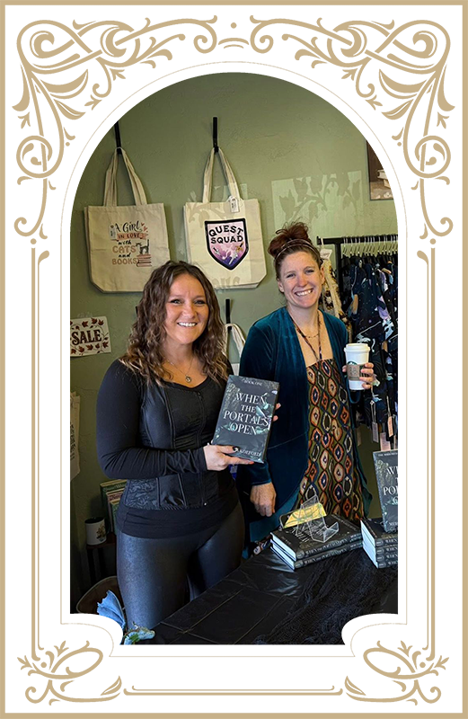 Woman holding small brown bag, smiling at a table with others. Snacks and books in the background.