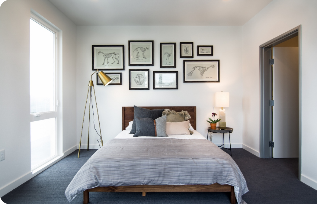 Bedroom with large bed in the middle.