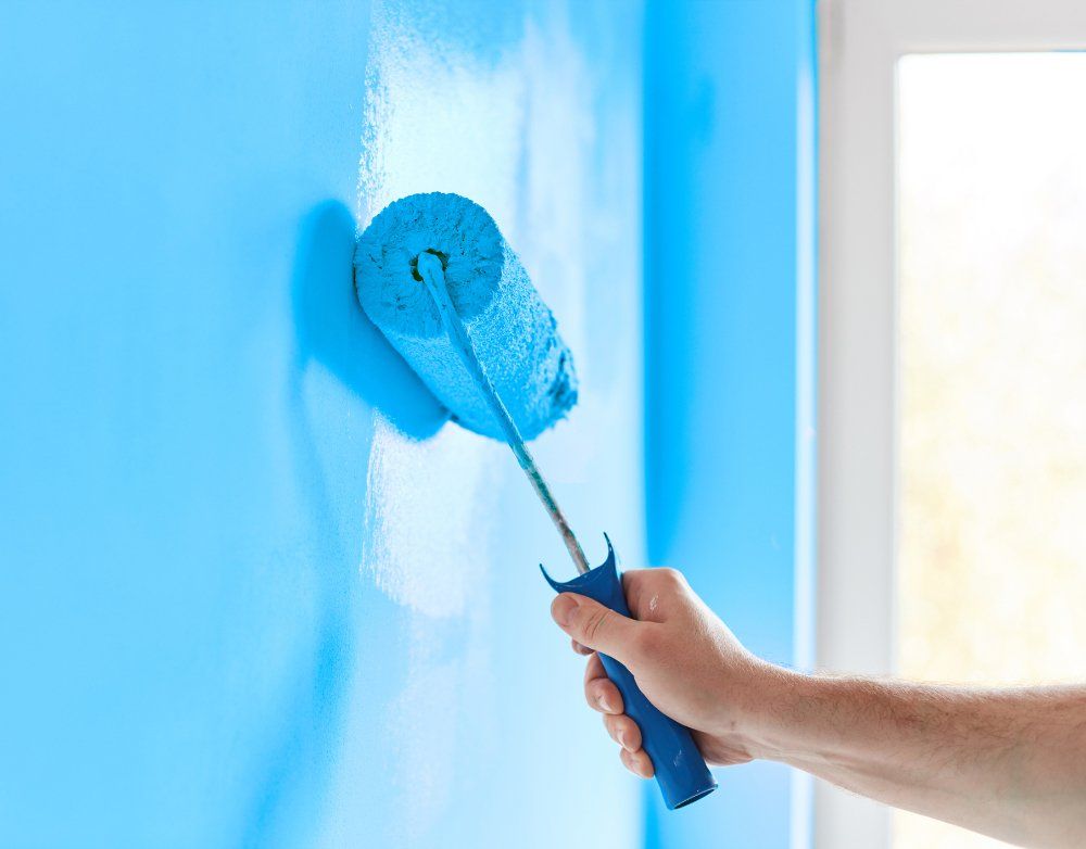 Painting Wall with Color Blue — Ingram, TX — Dean's Painting Tony