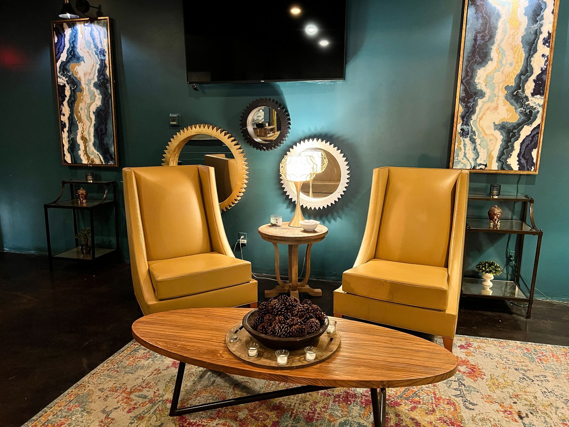 Two Yellow Chairs with teal blue wall in The Haven