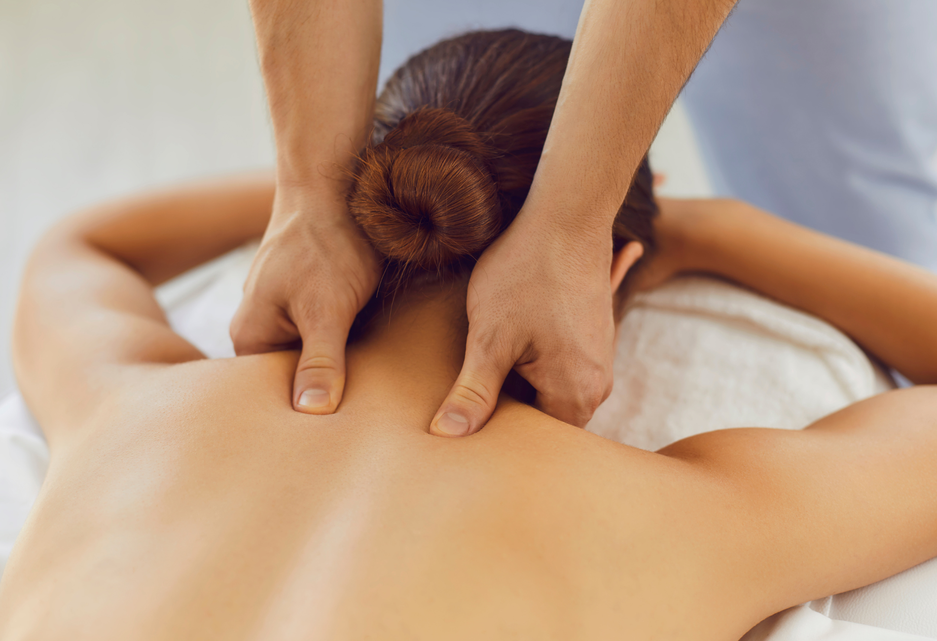 A woman is getting a massage at a spa.