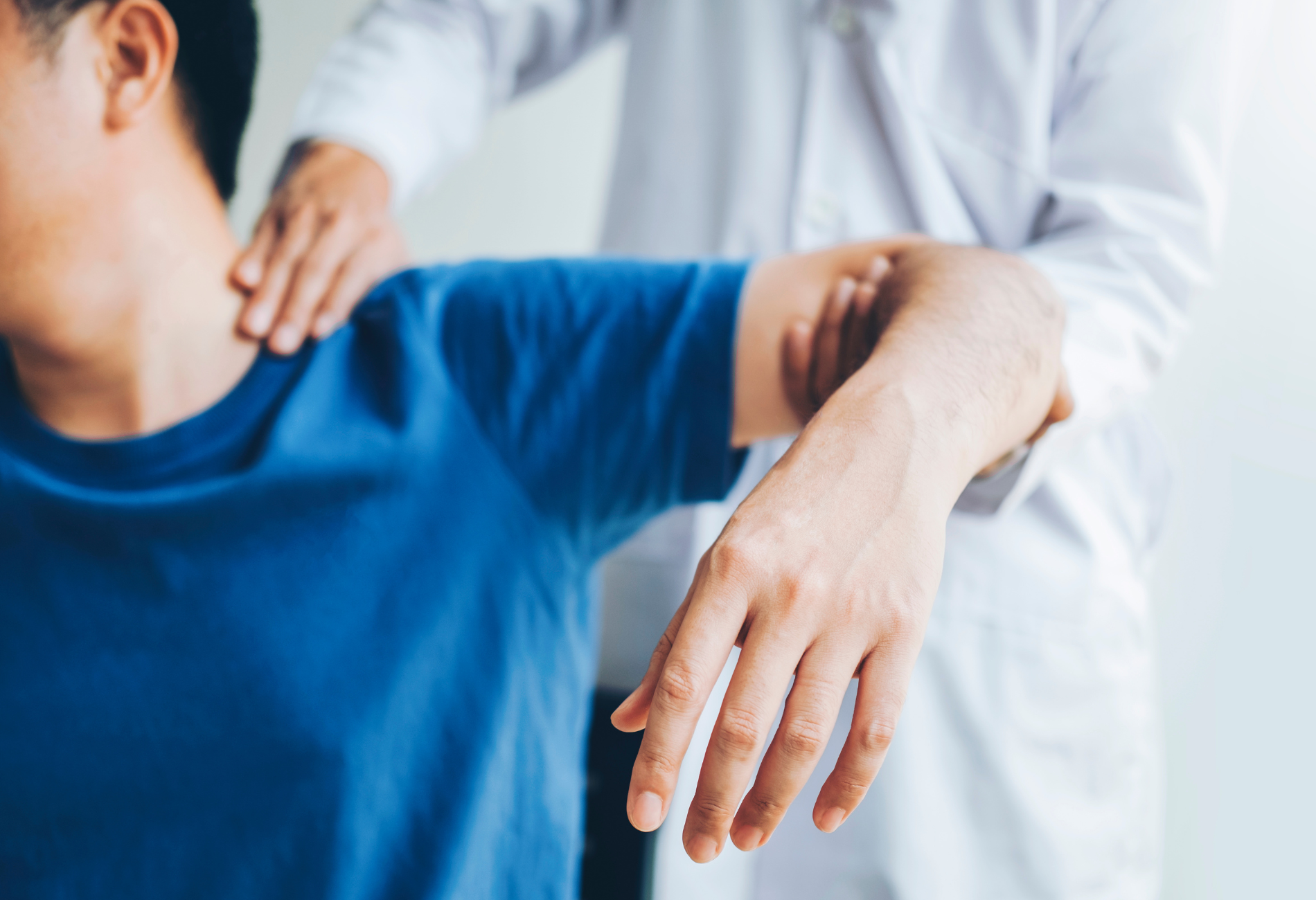 A nurse is putting a cast on a patient 's foot.