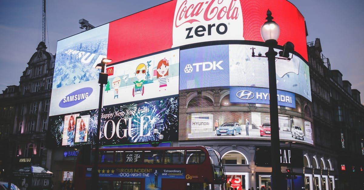 A coca cola zero sign is on the side of a building.