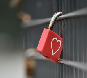 red padlock on gate