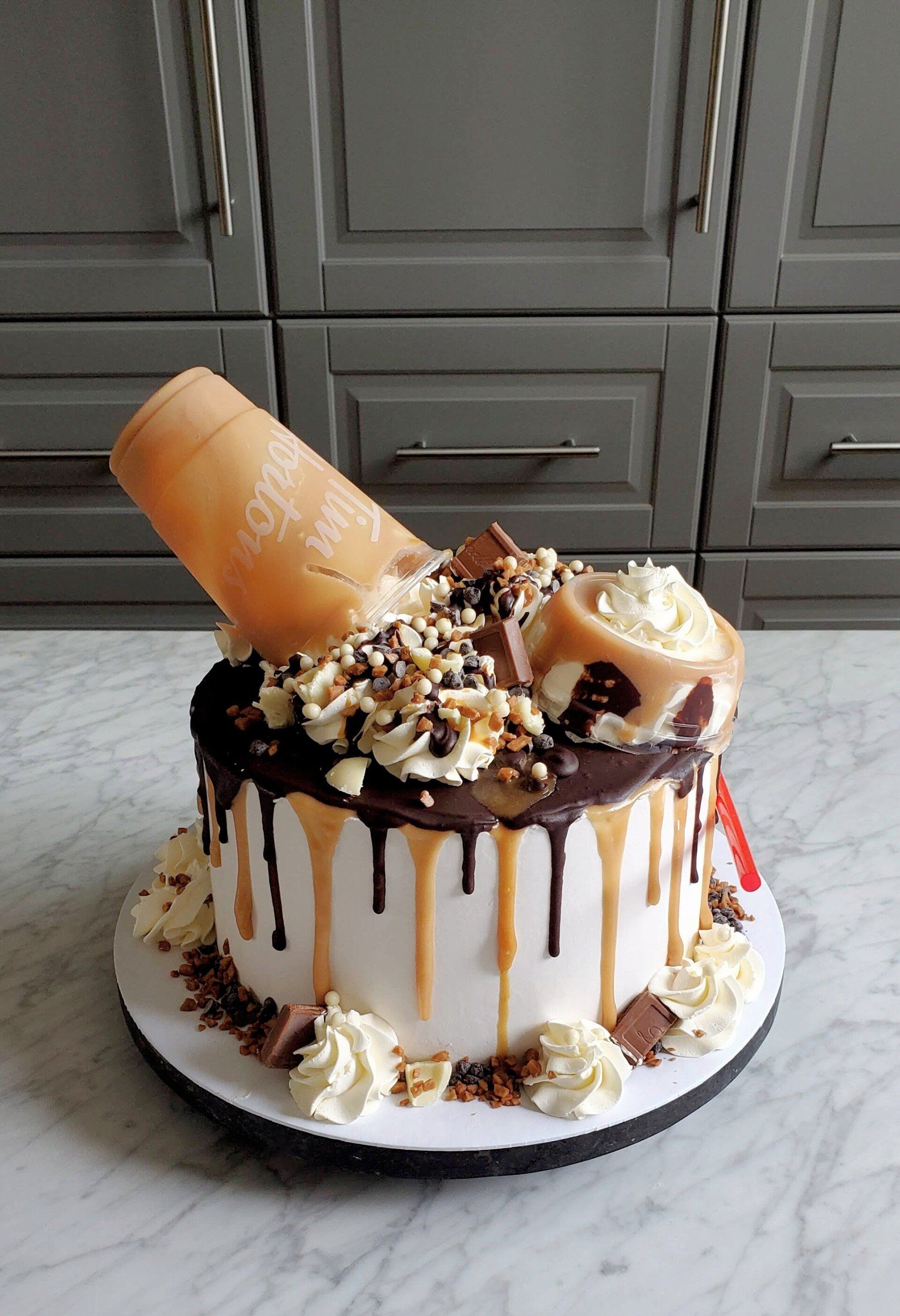 cake with spilled coffee cup and caramel