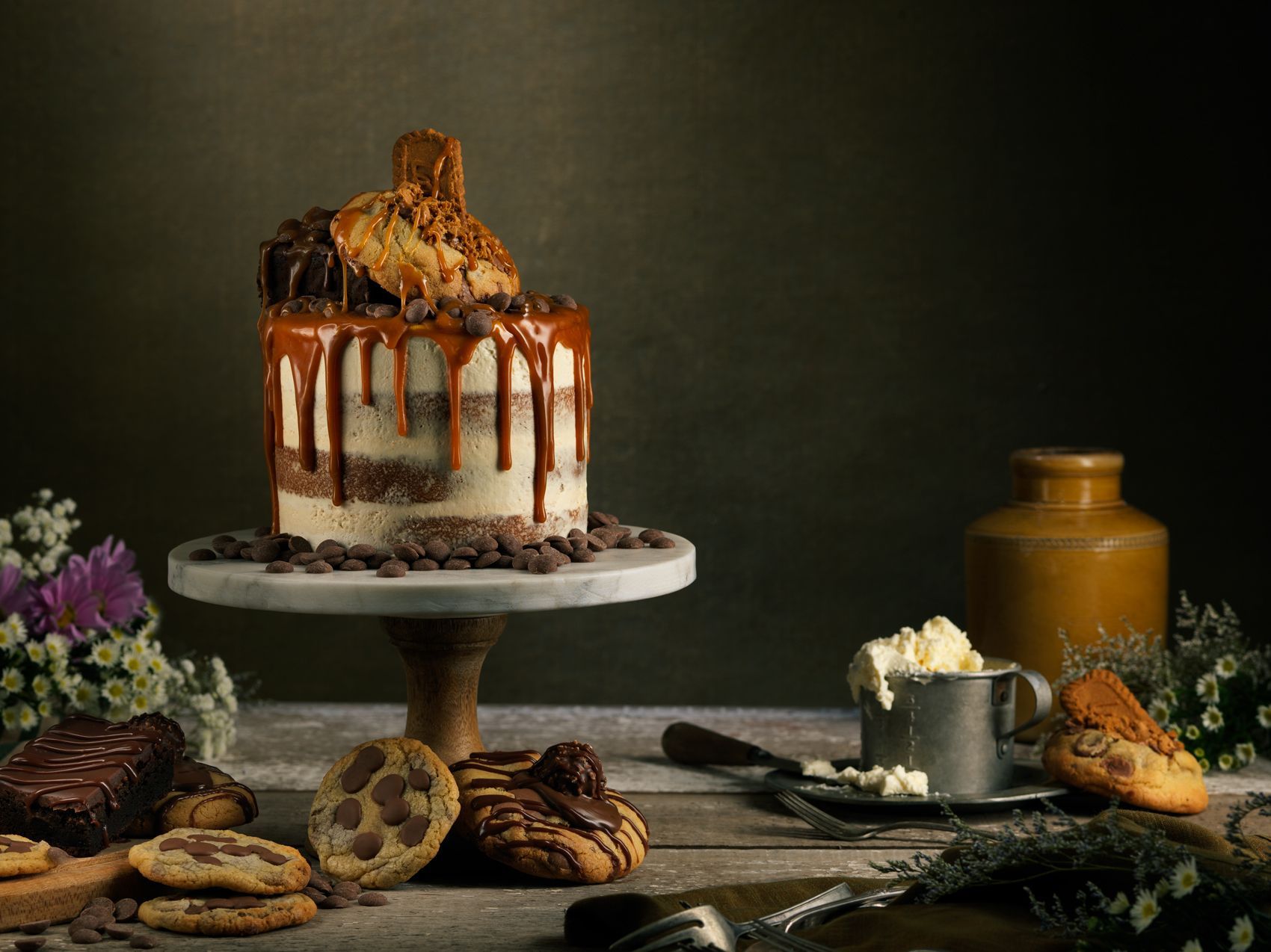 chocolate caramel cake on a stand