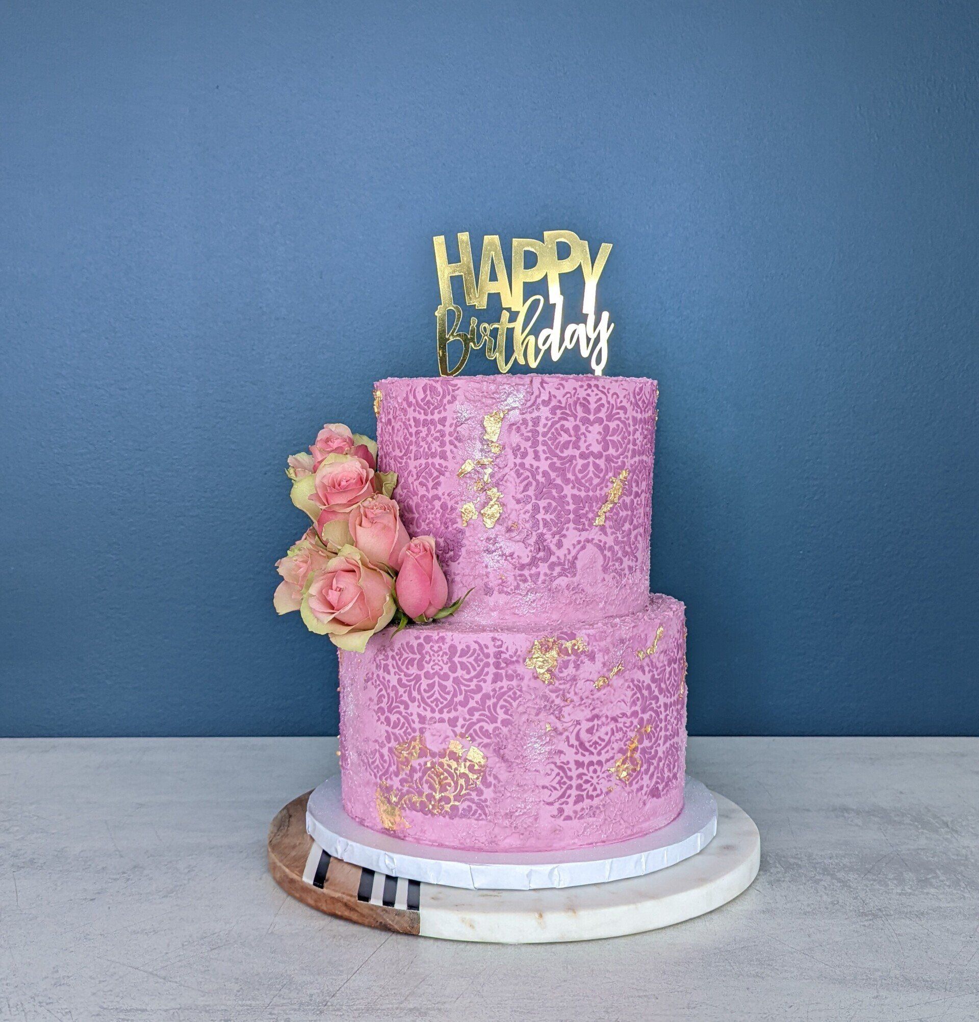 two tier purple floral cake