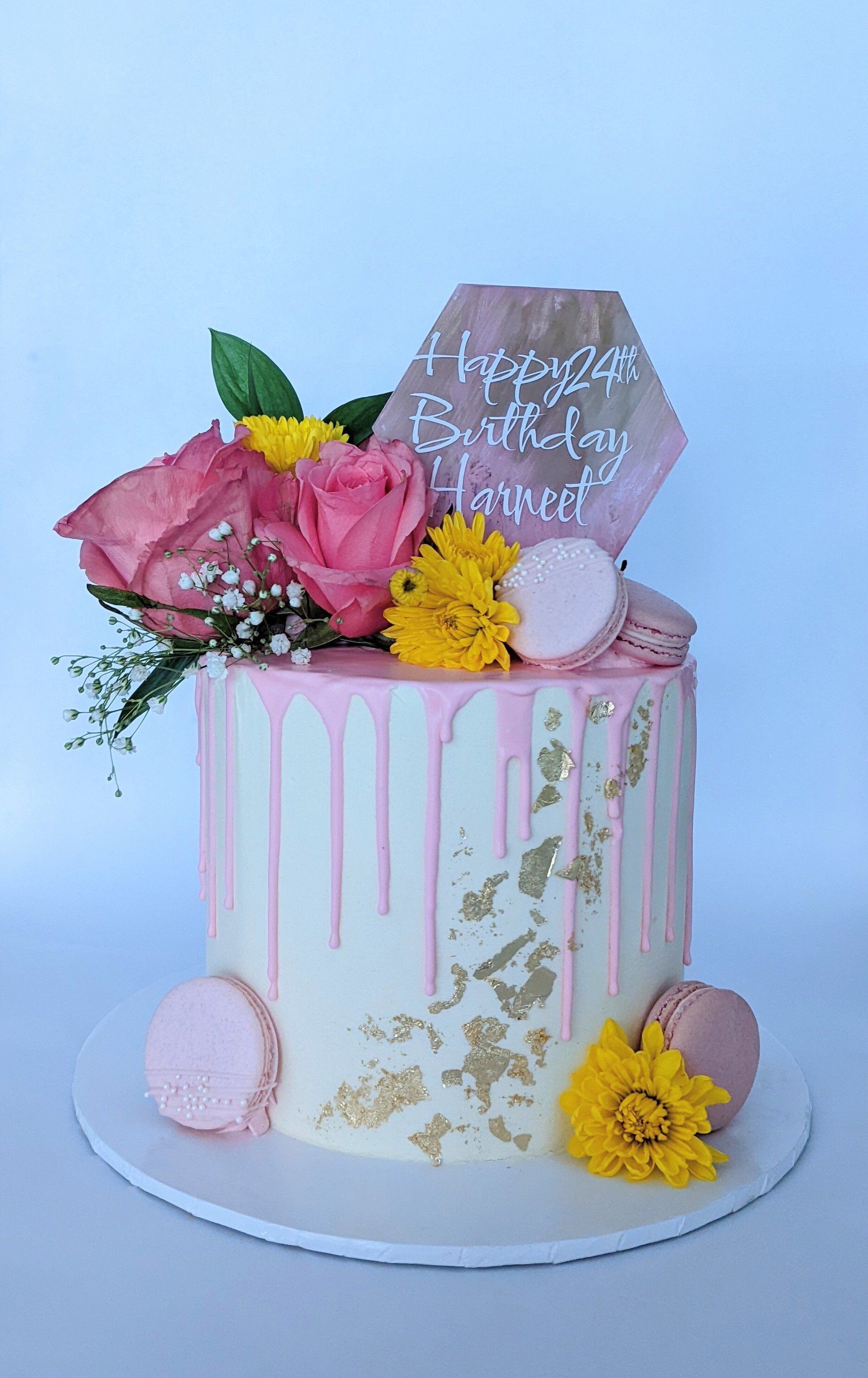 pink drip cake with florals