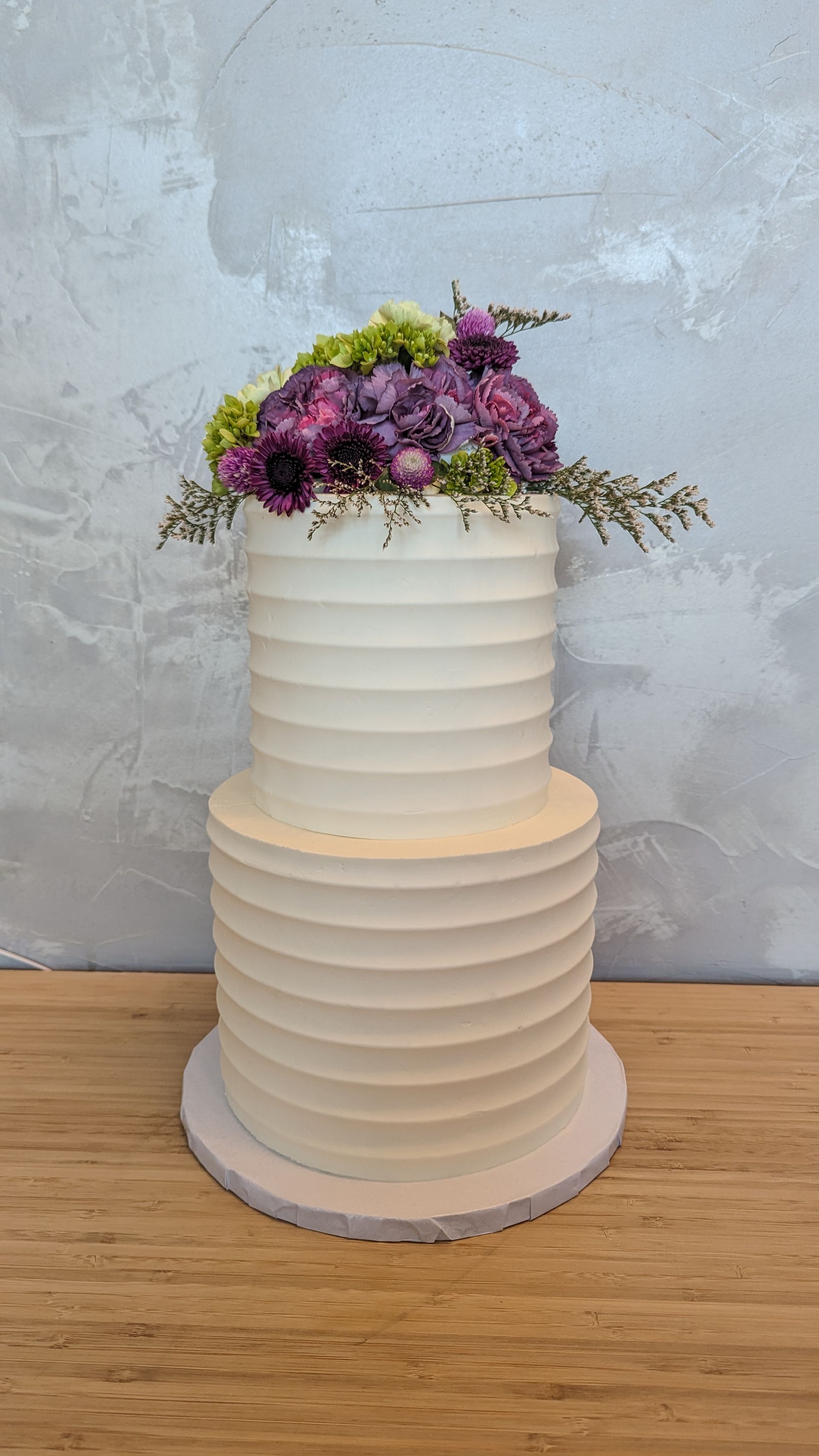 two tier textured cake with florals