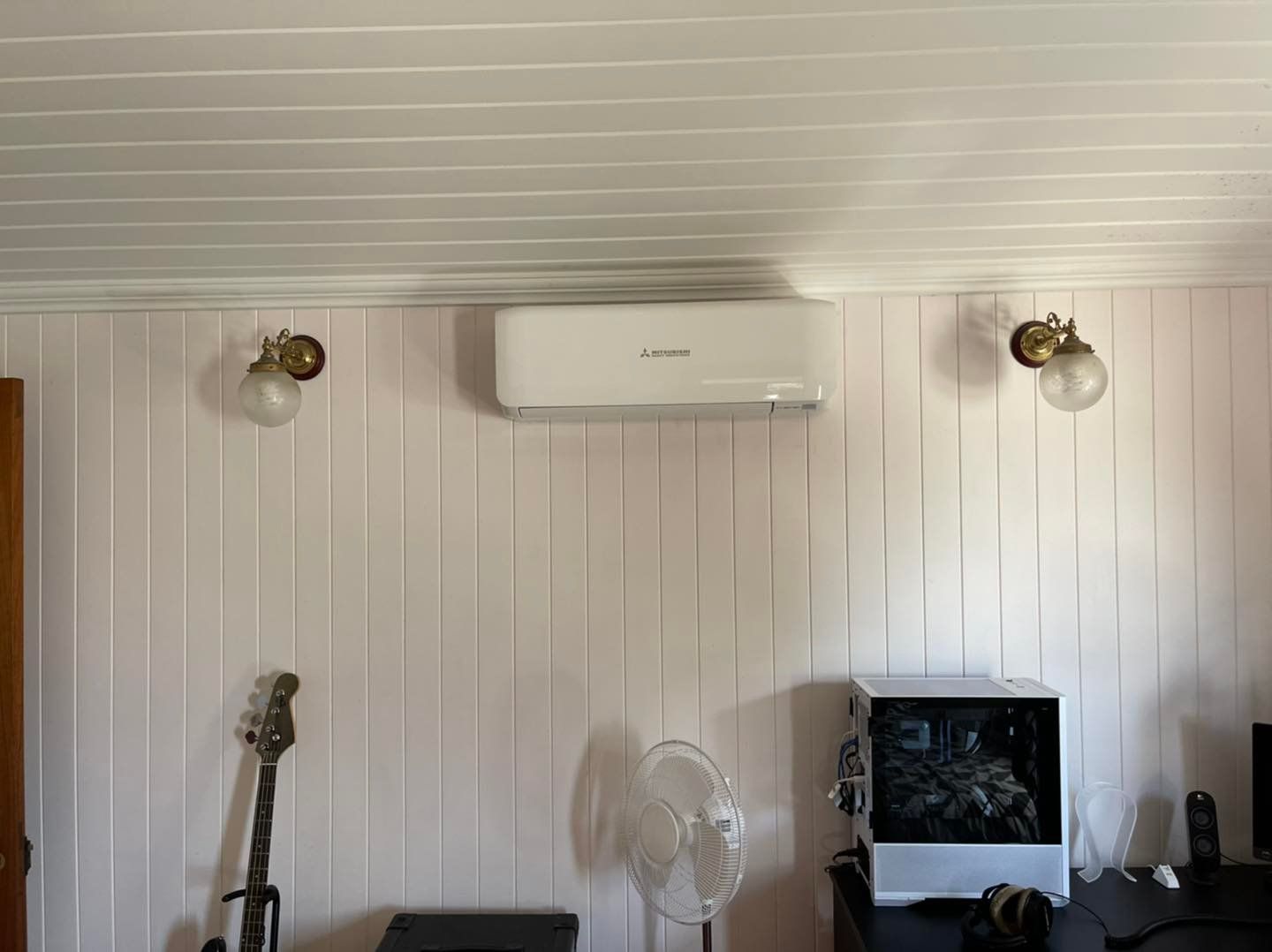 Air Conditioner Mounted on Wall — Air Conditioning & Electrical Services in Hervey Bay, QLD