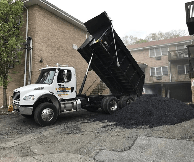 White Truck Fixing Pot Holes — Wayne, NJ — R. Williams Paving LLC