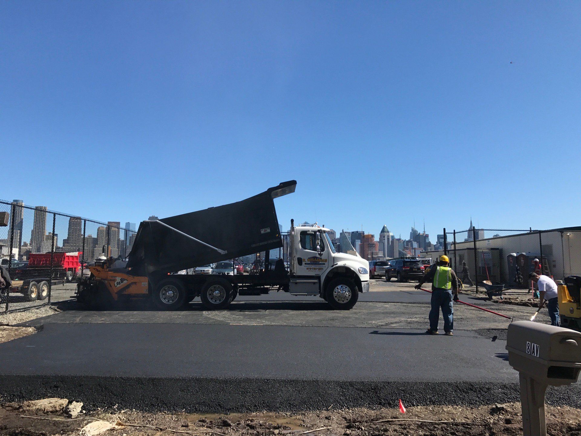 White Truck Pouring Asphalt Cement — Wayne, NJ — R. Williams Paving LLC