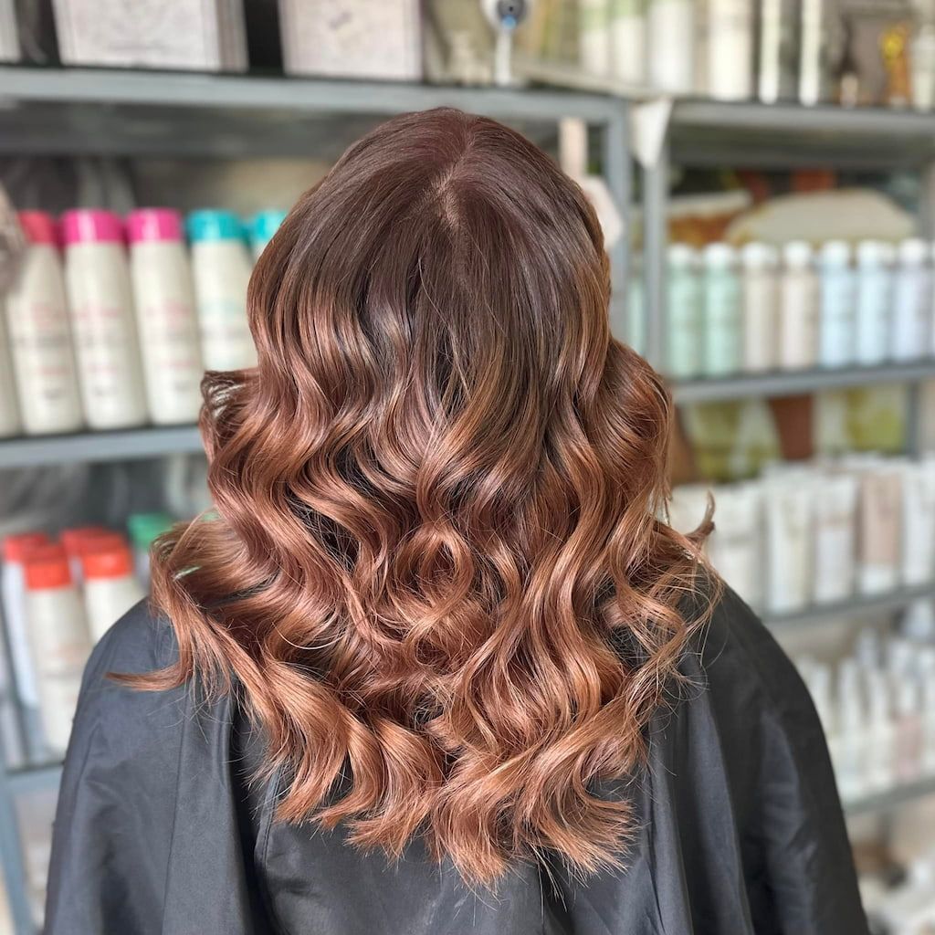 A Woman Has Had Her Hair Dyed In A Salon — L'Auranda Hair Salon In Evan St. Mackay, QLD