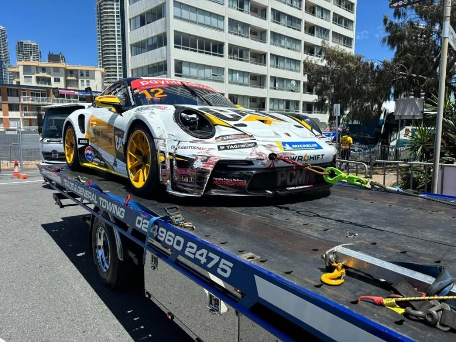 A Race Car is Sitting on Top of a Tow Truck — Trade & General Towing in Cessnock, NSW