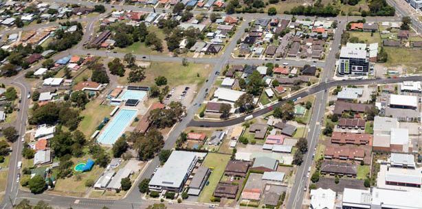 An Aerial View of a Residential Area With Lots of Buildings and Trees — Trade & General Towing in Beresfield, NSW