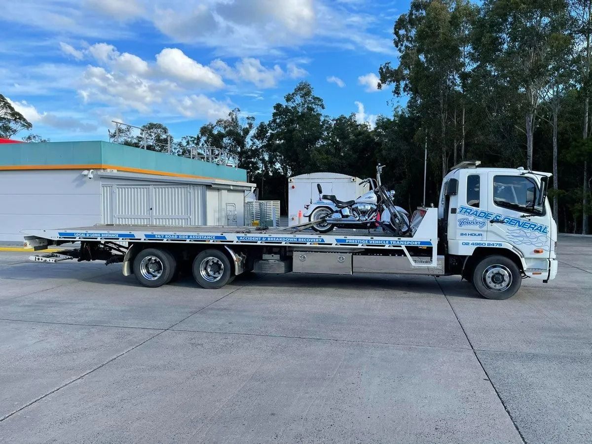 Flatbed Truck Carrying a Motorcycle