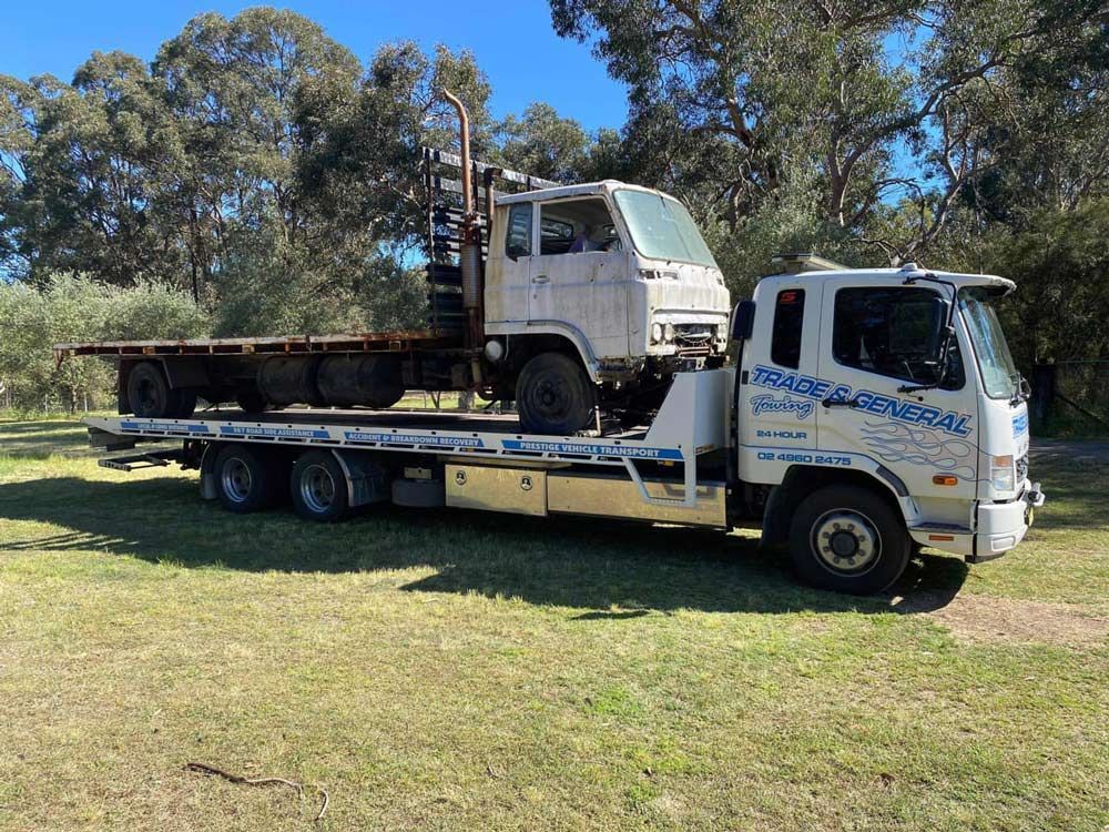 For Salvage Car Tow by Towing Truck — Trade & General Towing in Sandgate, NSW
