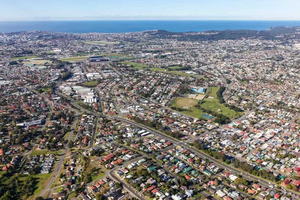 An Aerial View of a City With a Lot of Houses and Roads — Trade & General Towing in Lambton, NSW
