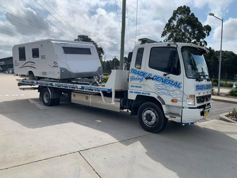 Motorhome Towed With White Towing Truck — Trade & General Towing in Sandgate, NSW