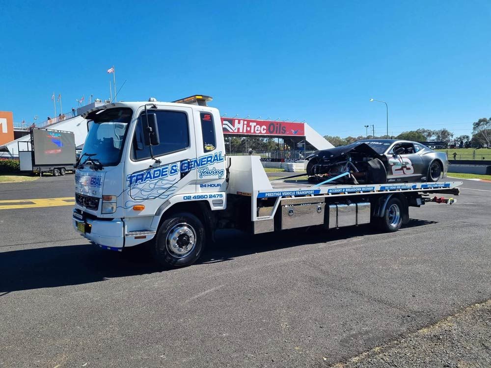 Number 23 Black Racing Car Crash — Trade & General Towing in Sandgate, NSW
