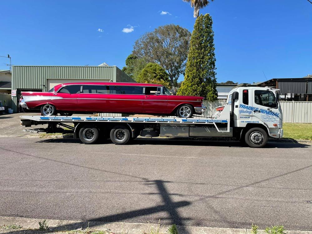 Red Chevy Bel Air Limo Car Towed — Trade & General Towing in Cardiff, NSW