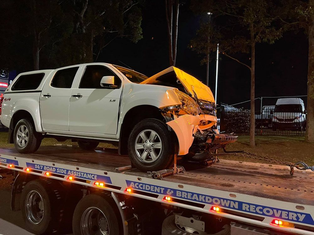 Towing 4x4 White Pick Up Accident — Trade & General Towing in Sandgate, NSW