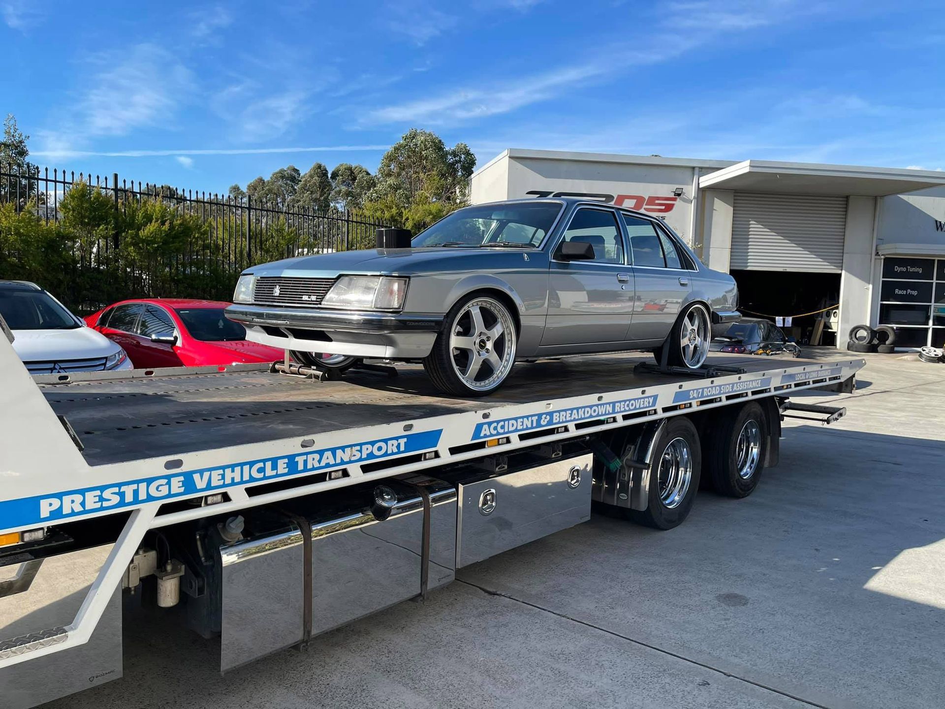 Towing the Silver Grey Car — Trade & General Towing in Sandgate, NSW
