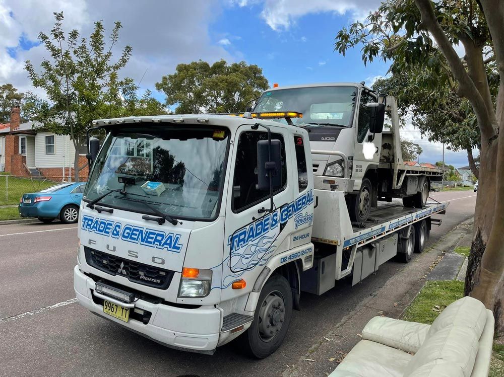 Towing the Truck and Parked on the Highway — Trade & General Towing in Sandgate, NSW