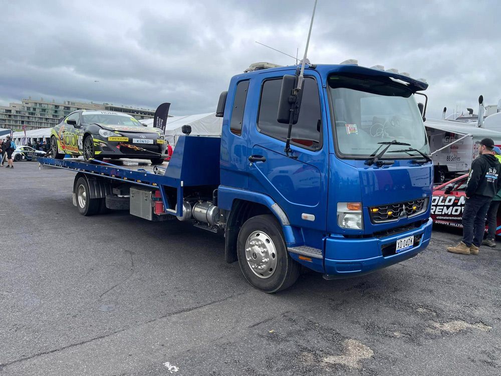 Toyota Towed In The Blue Towing Truck — Trade & General Towing In Sandgate NSW
