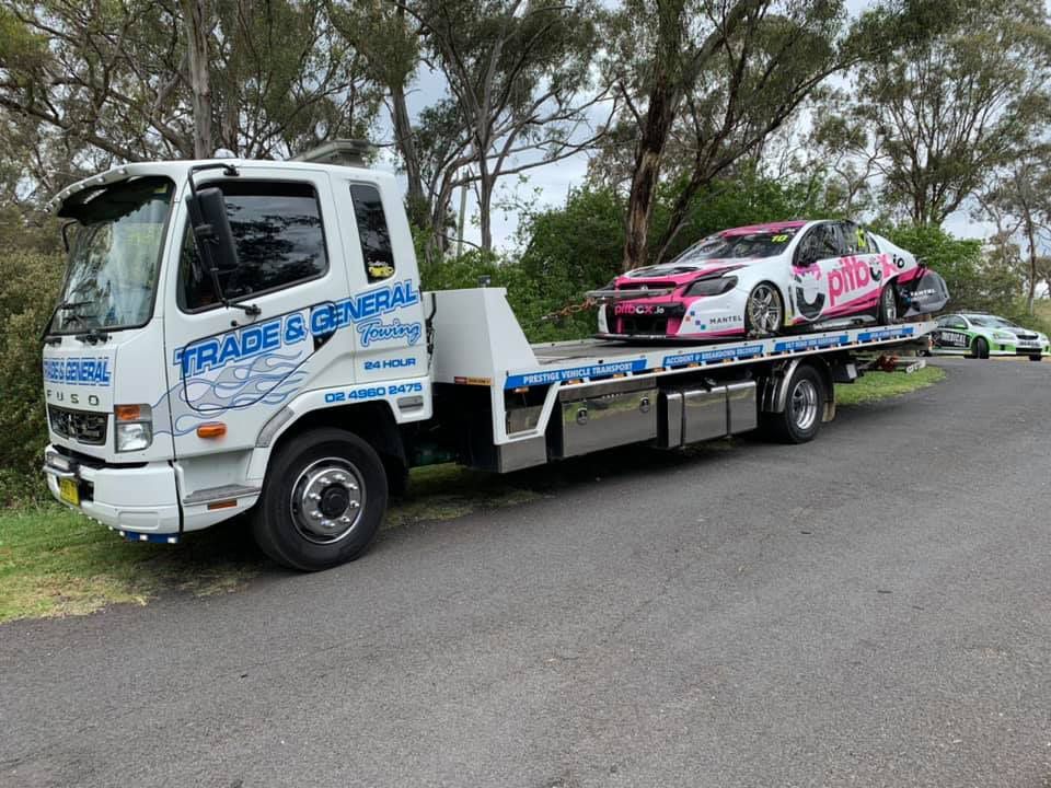 White and Pink Racing Car Towing — Trade & General Towing in Sandgate, NSW