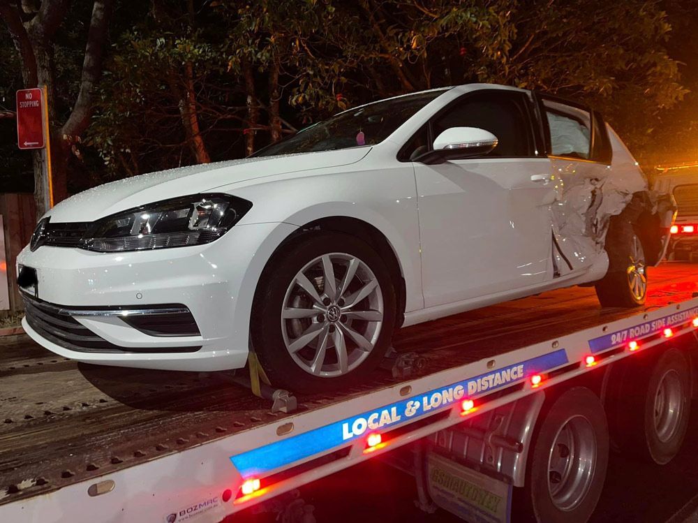 White Suv Wrecked on the Side and Towed — Trade & General Towing in Sandgate, NSW