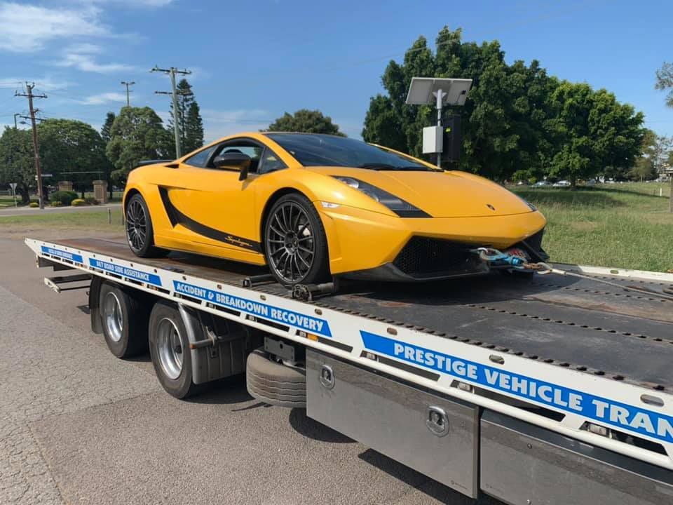 Yellow Lamborghini Gallardo Transport — Trade & General Towing In Sandgate NSW