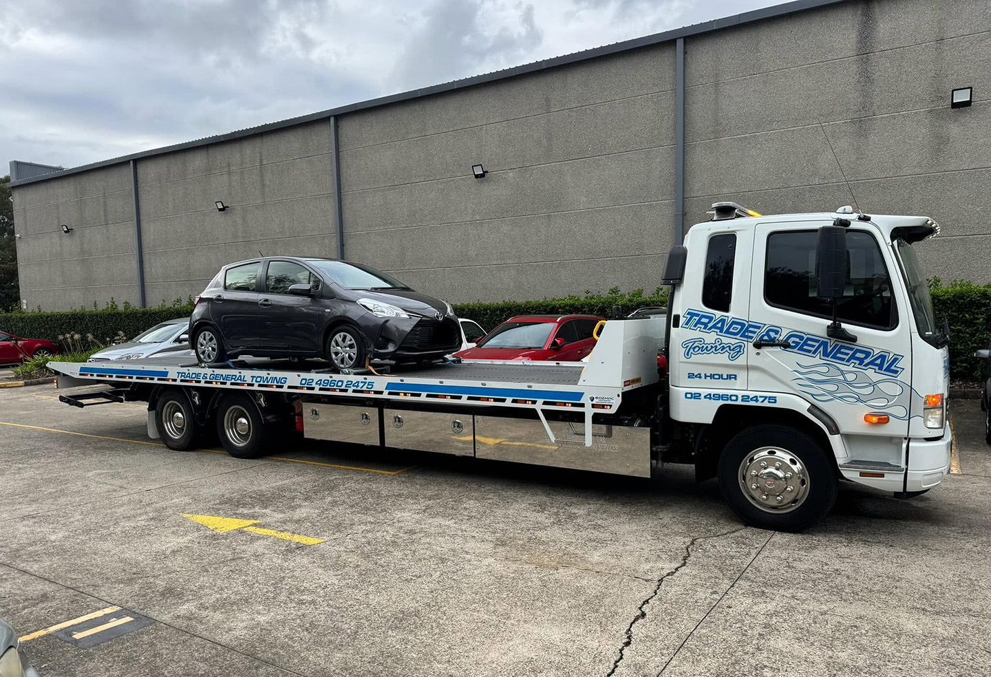 Car On Flatbed Tow Truck In Newcastle