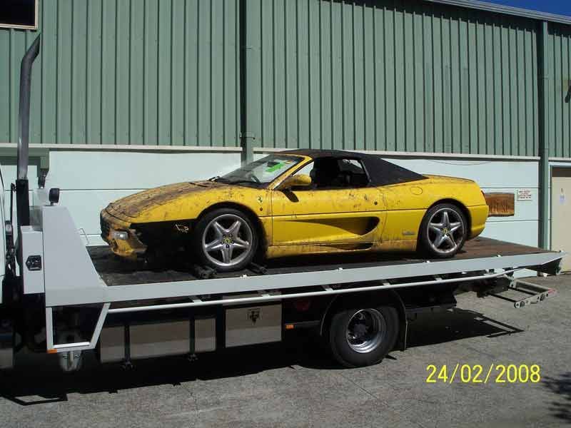 Towing The Old And Broken Yellow Sports Car — Trade & General Towing In Sandgate NSW