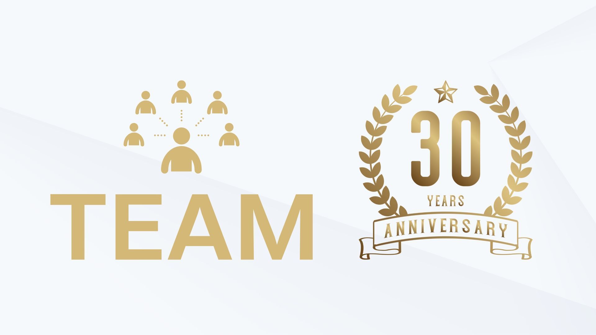 A group of people are standing next to each other next to a 30th anniversary logo.