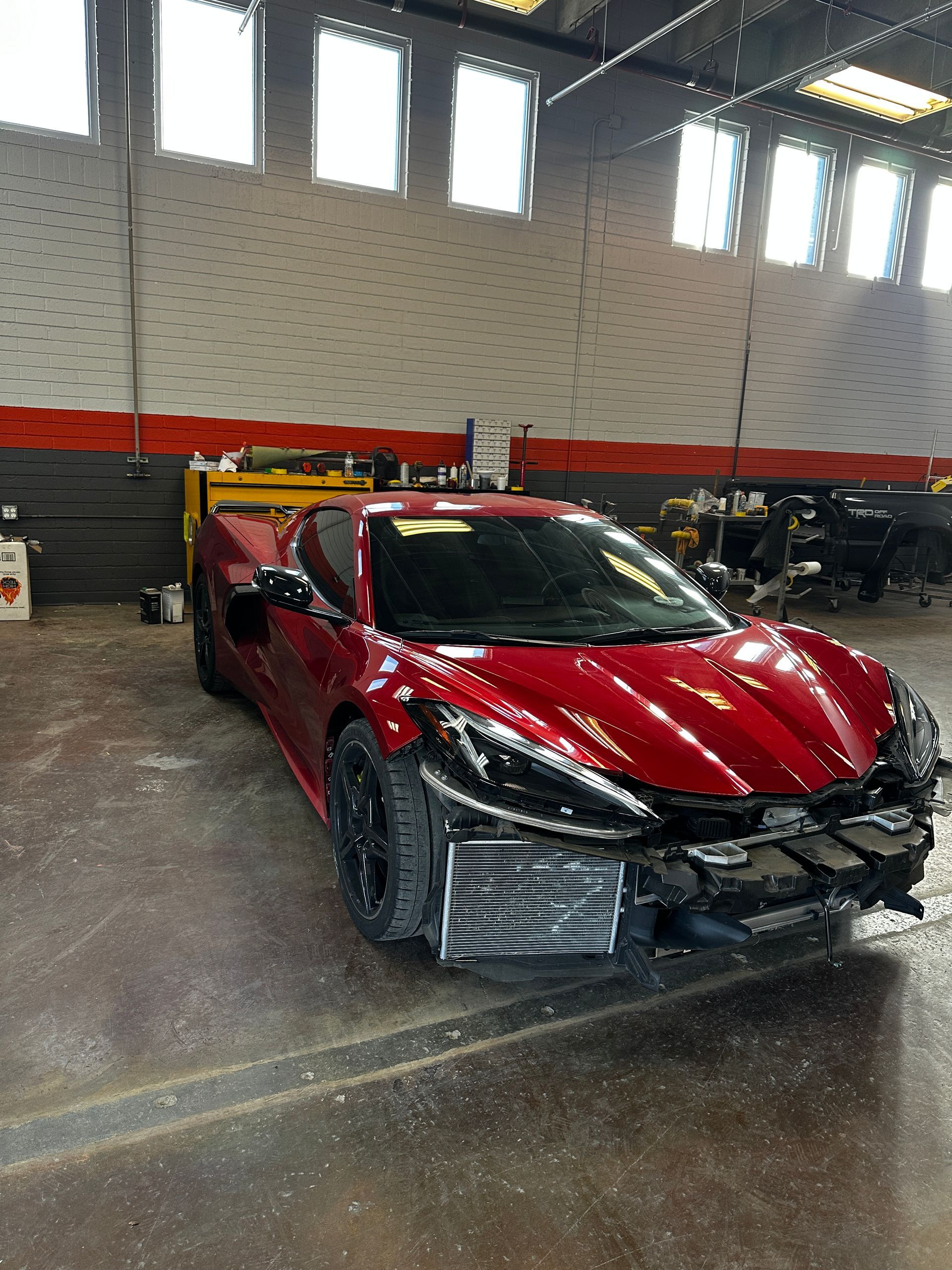 Auto body repair work in progress on damaged bumber