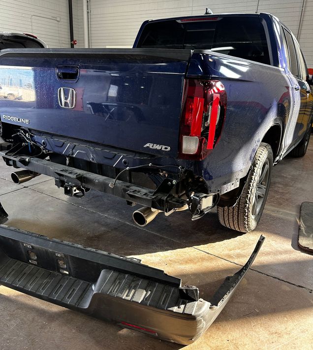 Vehicle being worked at Phoenix Zion Auto Body