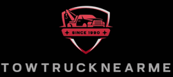 Logo of Tow Truck Near Me, red tow truck within a shield, "Since 1990" on a black background.