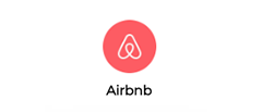 Airbnb logo: white stylized