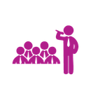 A person with a microphone speaking to a group of people.