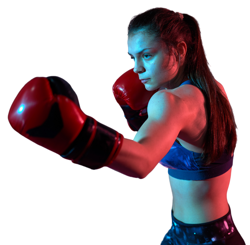 A woman is wearing red boxing gloves and a blue bra.