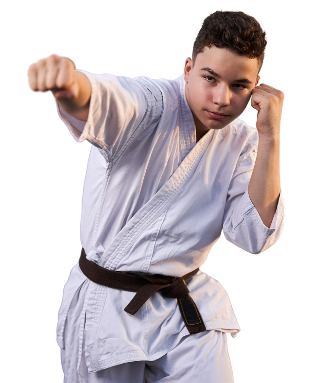 A young man in a white karate uniform with a black belt