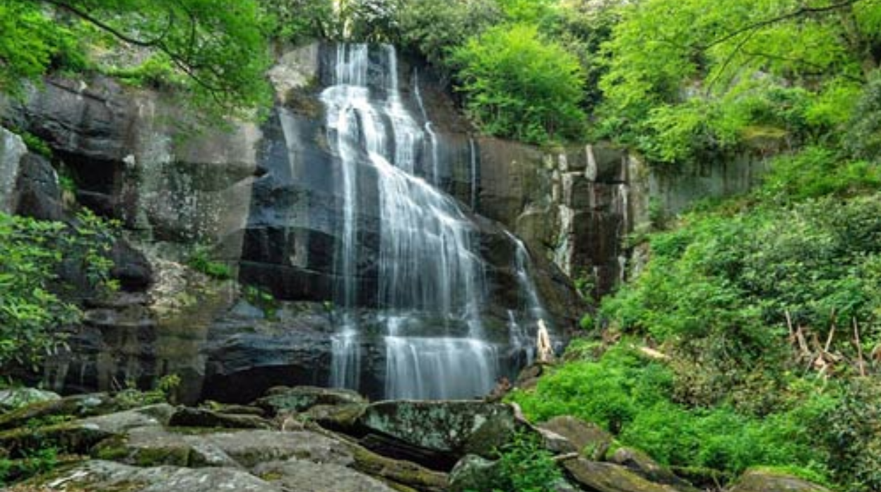 Waterfall with gorgeous limestone cliff in Fall Branch Tennessee